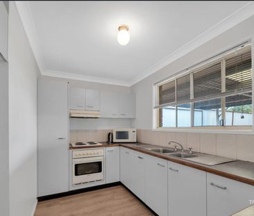 Charming Lowset Home with Spacious Yard & Easy-Care Living - Photo 5