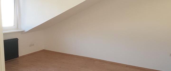 Dachgeschosswohnung mit Balkon 2 ZKB - Foto 1