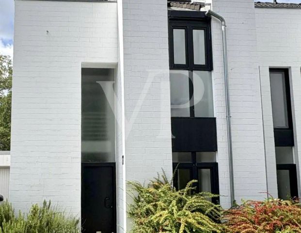 Einzigartiges Architektenhaus - Markante Doppelhaushälfte mit schönem Garten - Foto 1