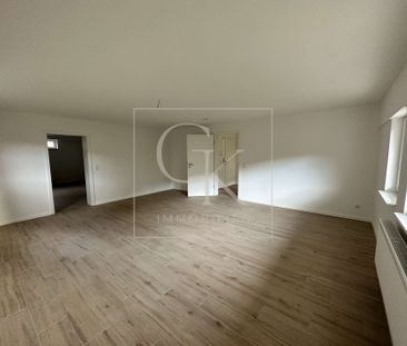 Erstbezug nach Modernisierung von geräumiger Souterrain-Wohnung (2 ... - Foto 1