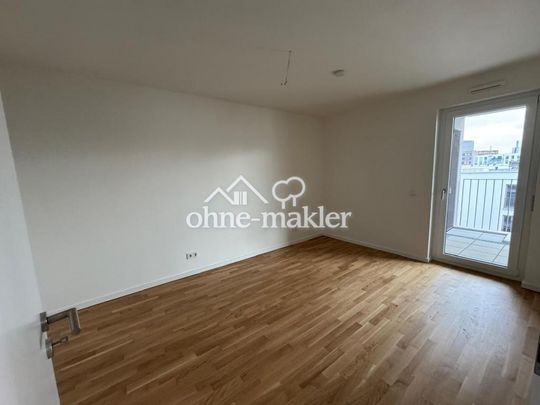 Neubau Erstbezug: 2-Zimmer Wohnung mit Skyline-Blick, Südbalkon und hochwertiger Küche - Photo 1