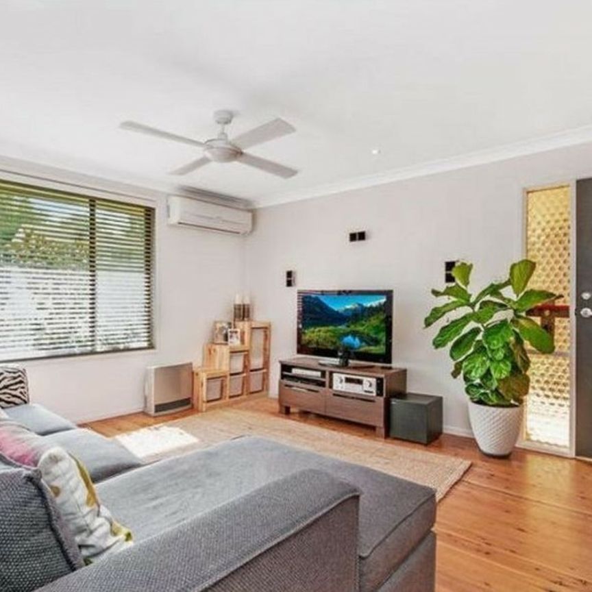 Neat Three-Bedroom Home in Convenient Location - Photo 1