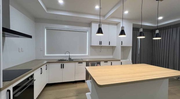 Fully Renovated and Exceptionally Convenient - Photo 1