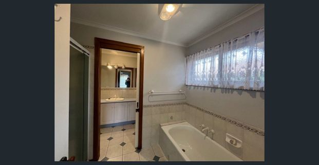 CHARMING BRICK VENEER HOME WITH SPACE AND COMFORT - Photo 1