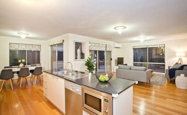 Modern Family Home in the Heart of Deer Park! - Photo 1