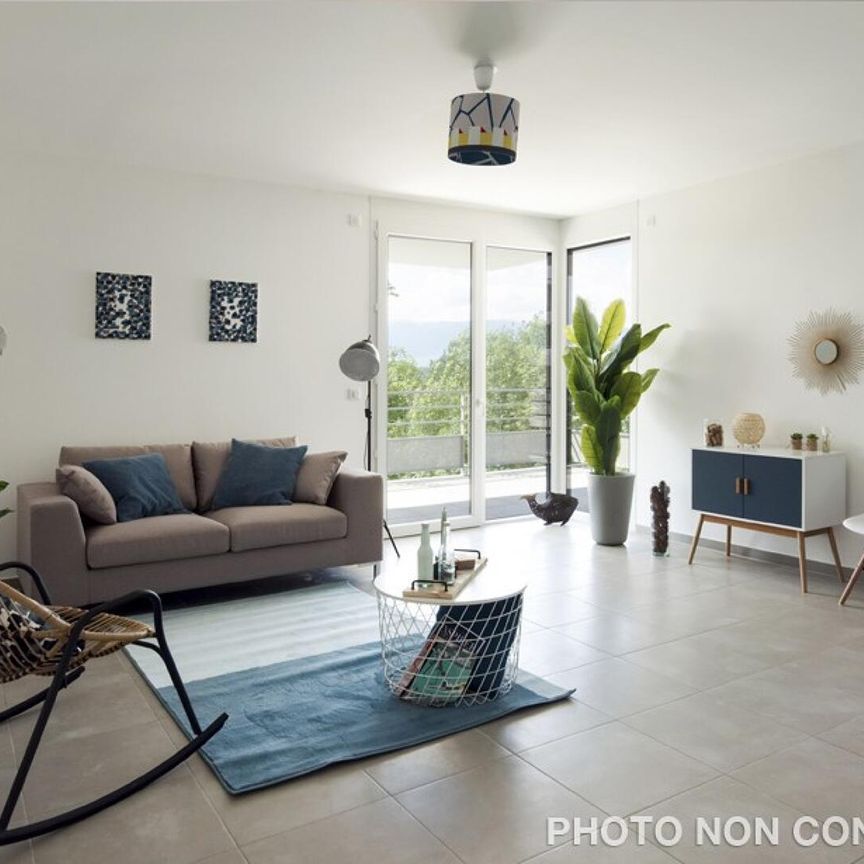 location Appartement T2 DE 59.57m² À SAINT JULIEN EN GENEVOIS - Photo 1