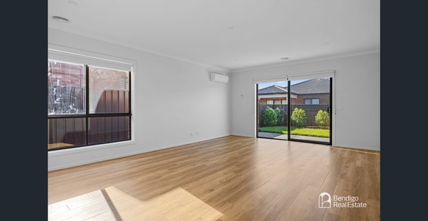 SPACIOUS FOUR-BEDROOM FAMILY HOME WITH YEAR-ROUND COMFORT - Photo 1