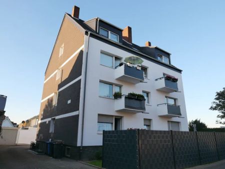 Hübsche 2-Zimmer-Dachgeschoss-Wohnung im Herzen von Asberg - Photo 5