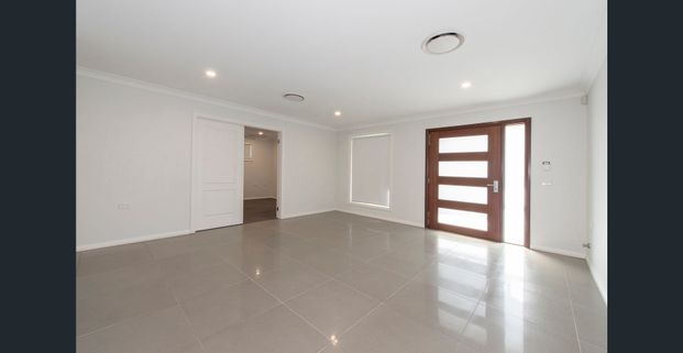 So Much More Than Your Average Townhouse - Photo 1