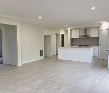 Available Now! This Stunning Modern 4-Bedroom Home! - Photo 3