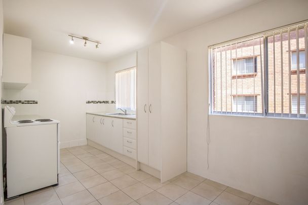 Light Filled Unit in Ideal Location - Photo 1