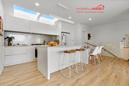 Spacious Designer Home with Flexible Living Across Three Levels - Photo 2