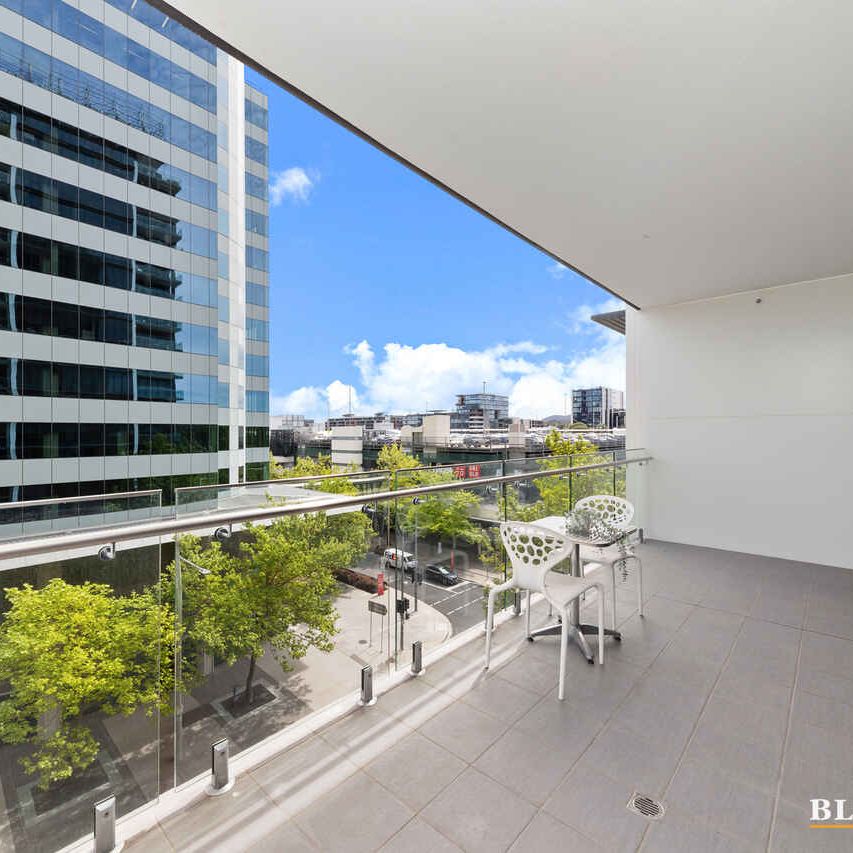 FULLY FURNISHED AT THE "MANHATTAN" - Photo 1