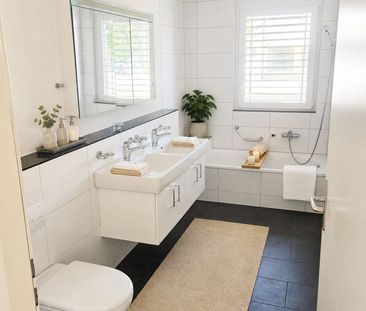 Exklusive 4.5-Zimmer-Gartenwohnung mit 400 m² Privatgarten in Aesch - Photo 6