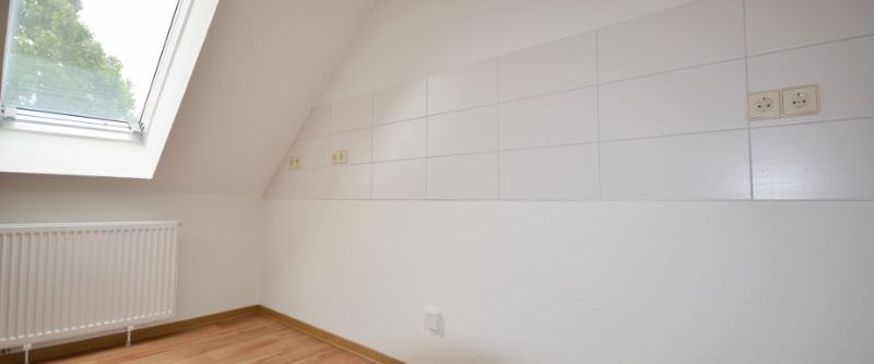 Charmante und großzügige Dachgeschosswohnung! - Foto 1