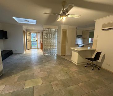 Spacious Three-Bedroom Family Home in Convenient Location - Photo 4