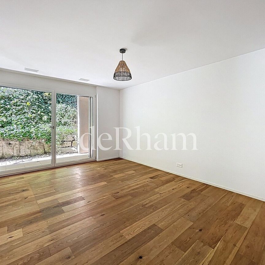 Superb and spacious 4.5-room apartment with garden! - Photo 1