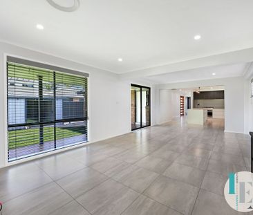 Modern 4-Bedroom Family Home in Prime Albion Park Location - Photo 1