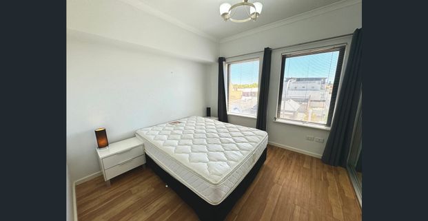 Partly Furnished Top Floor Apartment - Photo 1