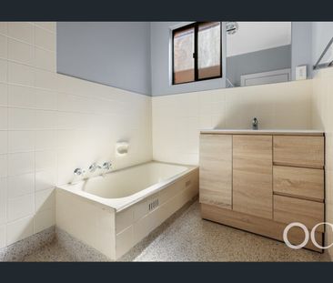 Open the door to easy living by the coast - Photo 6