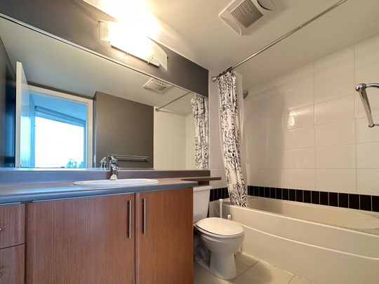 Bright 2 Bed High Rise Condo With False Creek Views - Photo 1