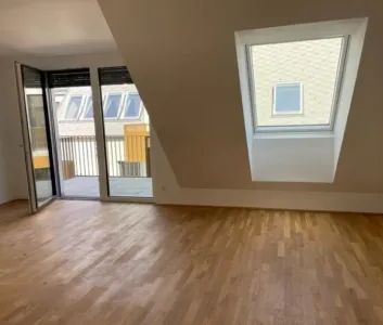 1 Monat mietfrei! Helle 2-Zimmer-Dachgeschosswohnung mit Balkon & voll ausgestatteter Küche im 22. Bezirk, Nähe zum Donau Zentrum und zur Alten Donau. Verfügbar ab 25.10.2026. - Foto 3