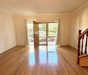 Secure Low Maintenance 3-bedroom Townhouse - Photo 1