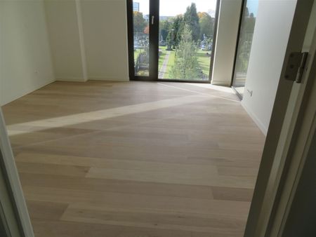 Prachtig nieuwbouwappartement met één slaapkamer, terras en parking! - Photo 2