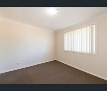 Spacious Three-Bedroom Unit in Prime Position - Photo 5