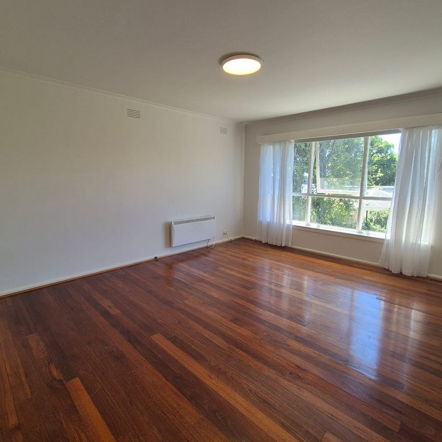 Light-Filled Two Bedroom Apartment in Manicured Complex - Photo 1