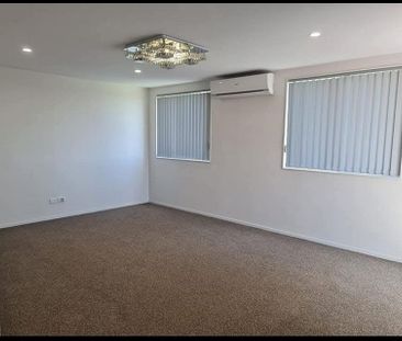 Spacious 4BR Home with Modern Comforts - Photo 1