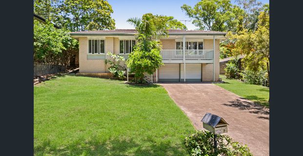 Semi Renovated Family Home in Sought-After Fig Tree Pocket - Photo 1