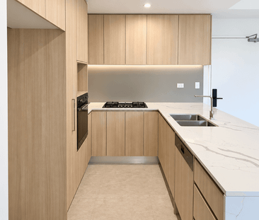 Designer Two-Bedroom Living with a Beautiful Treetop Outlook - Photo 4