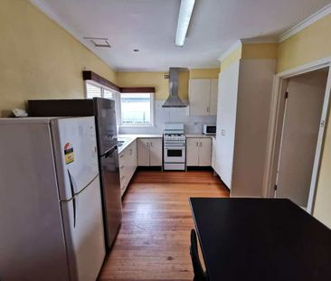 Spacious Fully Furnished 4 bedroom Home in a Prime Location - Photo 2