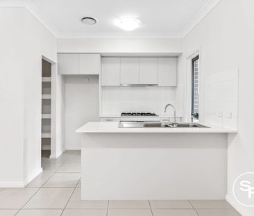 Single Living Area Home with Versatile Downstairs Space & Large Yard - Photo 2