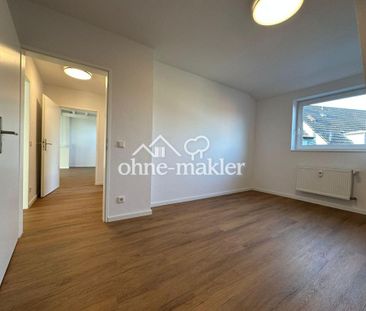 Frisch sanierte Dachgeschosswohnung mit neuer Einbauküche - Photo 6