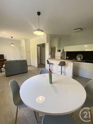 Appartement T2 à louer 2 pièces - 48,20 m2 CHATEAUNEUF LES MARTIGUES - 13 - Photo 2