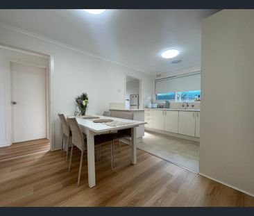 Neat 2 Bedroom Unit in Convenient Location - Photo 2