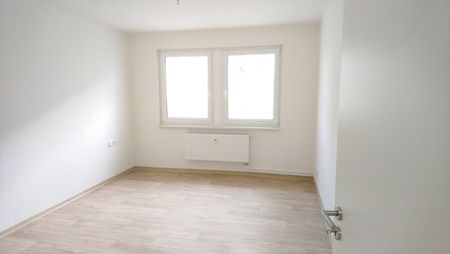 Modernisierte 4-Zimmer-Wohnung mit Balkon im Erdgeschoss - Foto 4