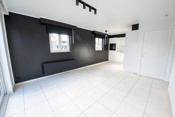 Volledig instapklaar gelijkvloers appartement met tuintje TE HUUR! - Foto 1