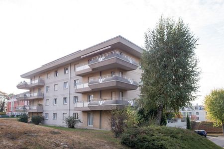 Au coeur d’un parc verdoyant, appartement de 4,5 pièces au 4ème étage - Photo 3