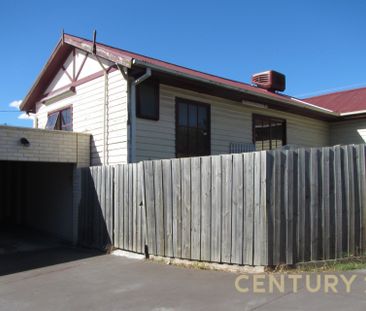 Comfortable & Convenient Unit in a Great Location - Photo 1