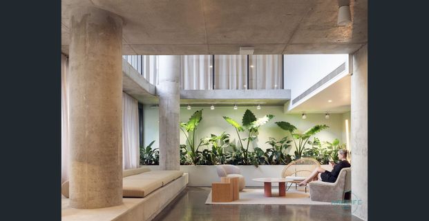 Stylish and spacious furnished apartment perfectly positioned in the vibrant James St Precinct - Photo 1