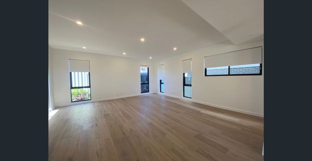 Modern Coastal Townhouse with Quality Finishes - Photo 1