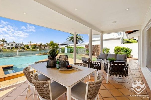 Stunning Canal-Front Home with Pontoon â Convenience Meets Lifestyle - Photo 1