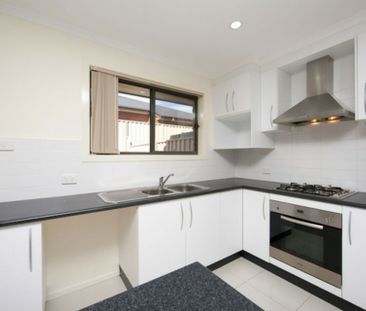 Neat Three Bedroom Townhouse - Photo 1