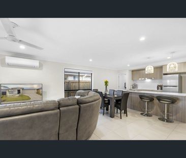 4-Bedroom Family Home with Modern Amenities in Palmview - Photo 3