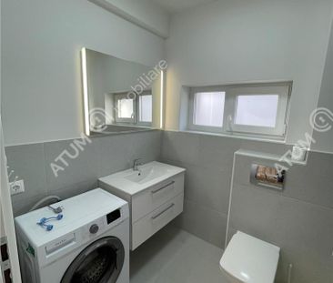 De inchiriat garsoniera la etajul 1 cu balcon si loc de parcare in ... - Fotografie 6