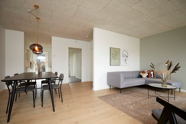 Lækkert rækkehus med plads til hele familien - Photo 1