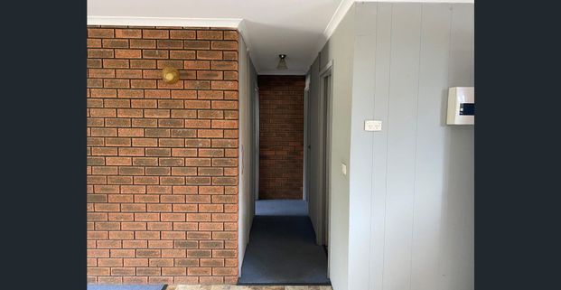 COSY UNIT IN A NEAT COMPLEX - Photo 1